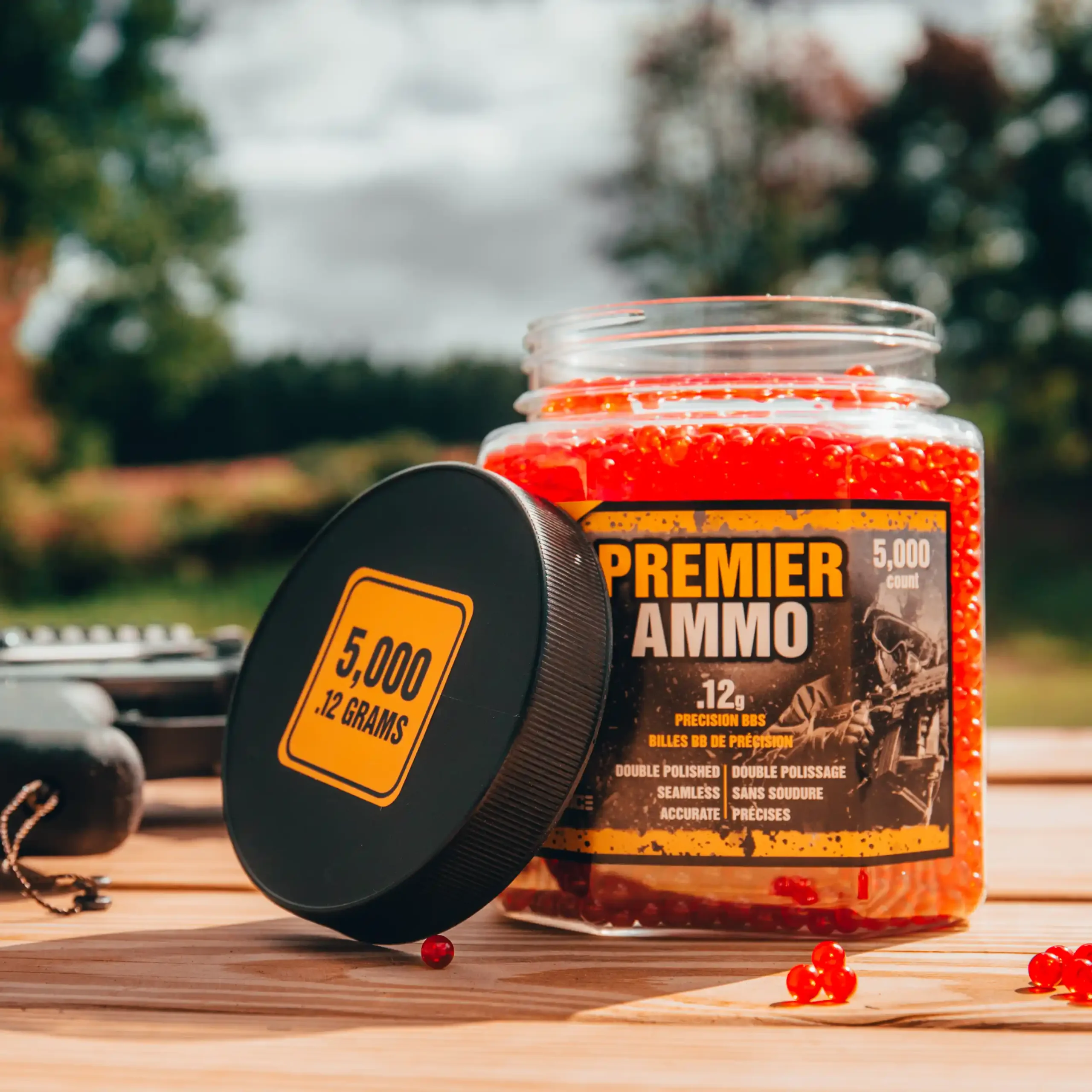 Game Face Premier Airsoft Ammo (.12) ASP512 Outdoor Lifestyle Sitting on Bench on Sunny Day